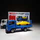 Illustration for article titled Makeitfit Monday: Isuzu Elf Vehicle Transporter by Tomica